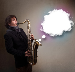 Fototapeta na wymiar Young man playing on saxophone with copy space in white cloud
