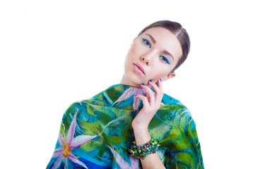 Fashion model long-haired girl with stylish colorful dress