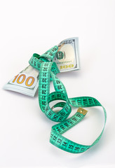 dollar tied with measure tape