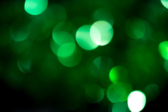 beautiful holiday background of green bokeh
