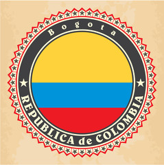 Vintage label cards of Colombia flag. Vector