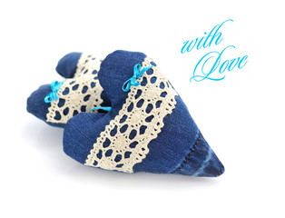 Two decorative jeans heart on a white background
