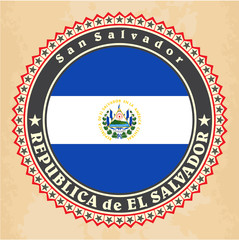 Naklejka premium Vintage label cards of El Salvador flag.