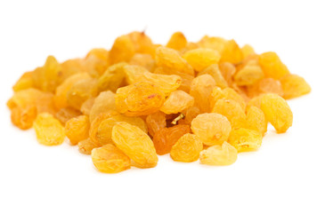 Golden raisins on a white background