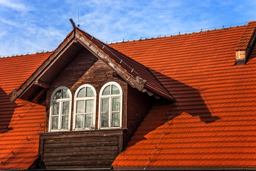 Old attic windows in a tiled roof.