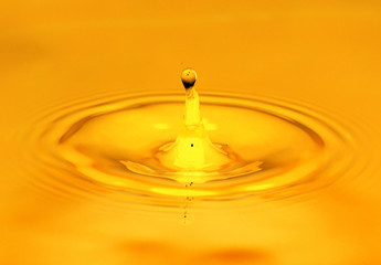 A drop of golden water. macro