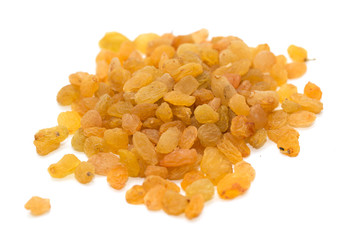 Golden raisins on a white background