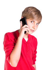 young boy using mobile cell phone