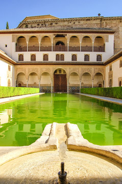 landscape in Alhambra, courtyard with green water