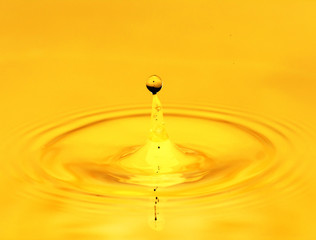 A drop of golden water. macro