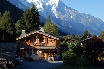 Mountain house over snow mountain view in Alps near Chamonix