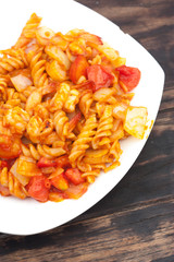 Pasta with tomato sauce and parmesan