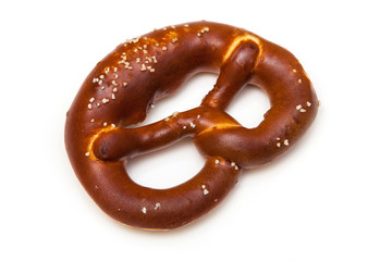 Rock salt pretzel isolated on a white studio background.