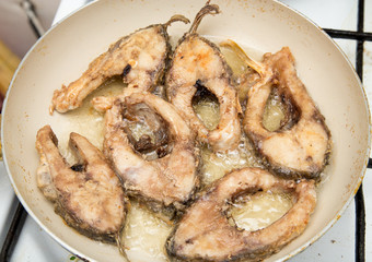 fish fried in a pan