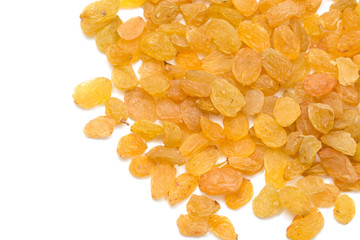 Golden raisins on a white background