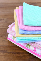 Kitchen towels on wooden background