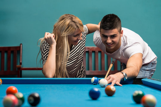 Young Adults Playing Pool