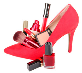 Beautiful red female shoe with cosmetics, isolated on white