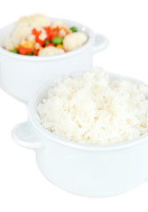 Cooked rice and vegetables close up