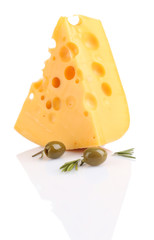 Piece of cheese with green olives, isolated on white