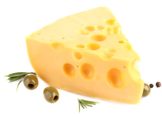 Piece of cheese with green olives, isolated on white