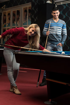 Young Adults Playing Pool