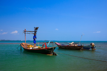 Fototapeta na wymiar Wood boat on thailand beach