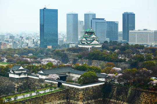 Osaka cityscape with traditional castle