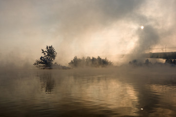 Bridge over the river in a fog