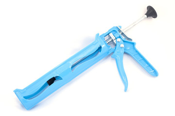 blue silicon gun on white background