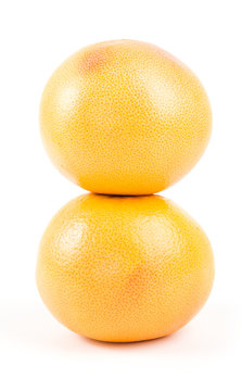 two fresh grapefruits