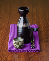 japanese cuisine. sake on the background