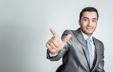 Businessman pressing an imaginary button