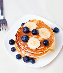 Pancakes with blueberry and bananas