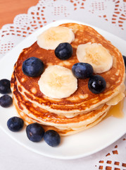 Pancakes with blueberry and bananas