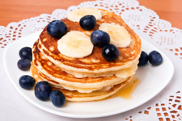 Pancakes with blueberry and bananas