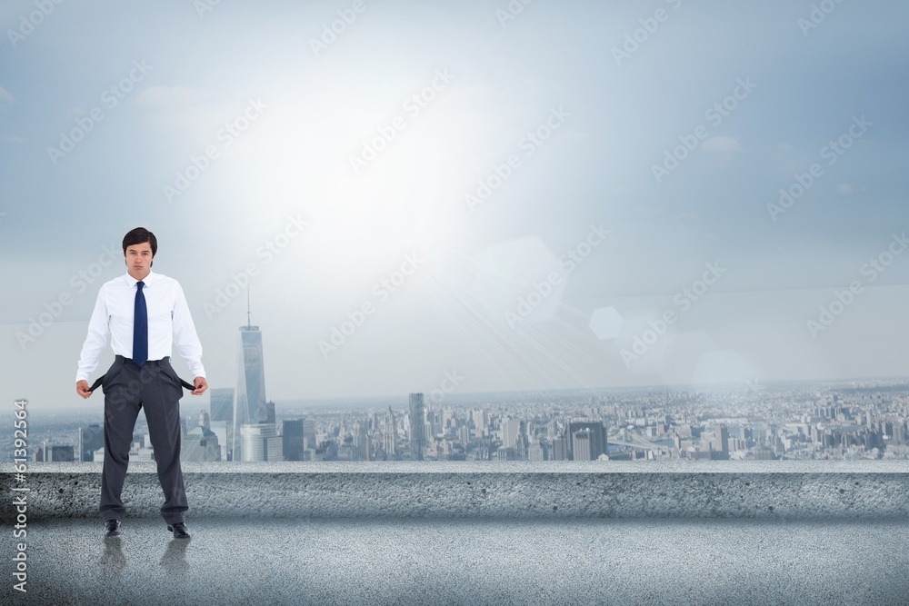 Poster Composite image of sad tradesman showing his empty pockets