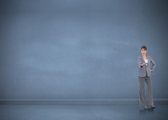 Obraz premium Composite image of attractive businesswoman holding tablet pc