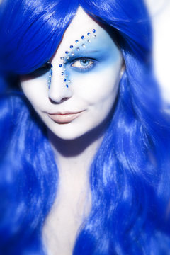 Beautiful woman with blue Hair and Make Up