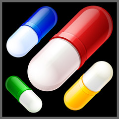 illustration of four multicolored pills