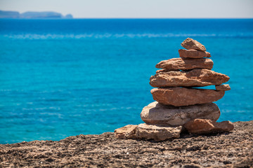 stack of stones on the beach and sea background. Set stones to r