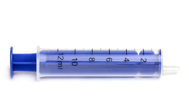 Blue syringe closeup.
