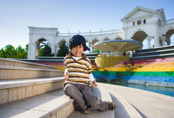 Chinese boy model with unhappy expression on face