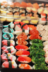 Japanese sushi - sushi egg, shrimp, crab stick, seaweed.