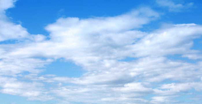 Blue cloudy sky horizontal background photo texture