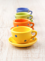 Fototapeta na wymiar Small colorful ceramic tea cups