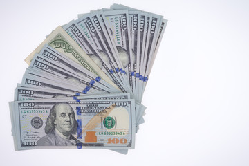 Fanned arrangement of 100 dollar bills