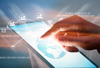 Hand touching digital tablet