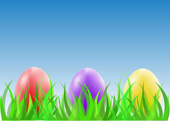 Easter eggs on the green grass