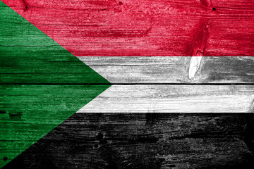 Sudan Flag painted on old wood plank texture